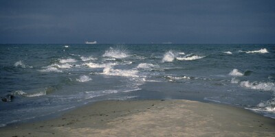 Grenen (DK). On the tip of Grenen, it is possible to stand with one foot in each of the two seas meeting there: the Skagerrak, which is part of the North Sea and stretches along the west coast of Jutland, and the Kattegat, which is the coastal water stretching east towards the Swedish coast. 